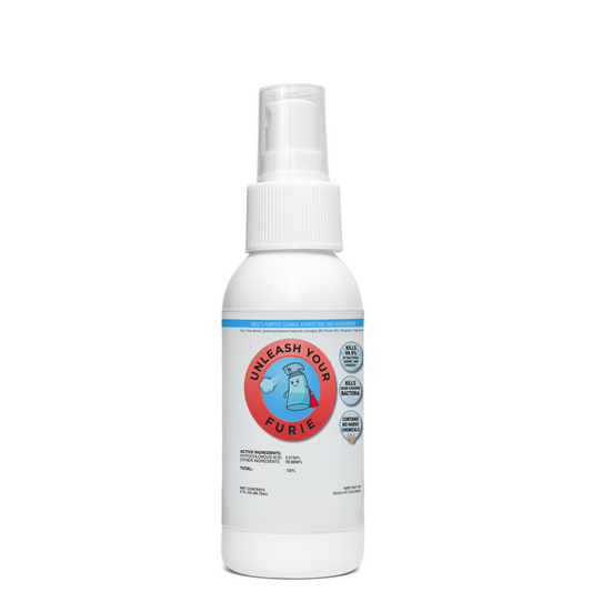 White spray bottle with a label on a white background