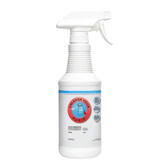 White spray bottle with a label on a white background